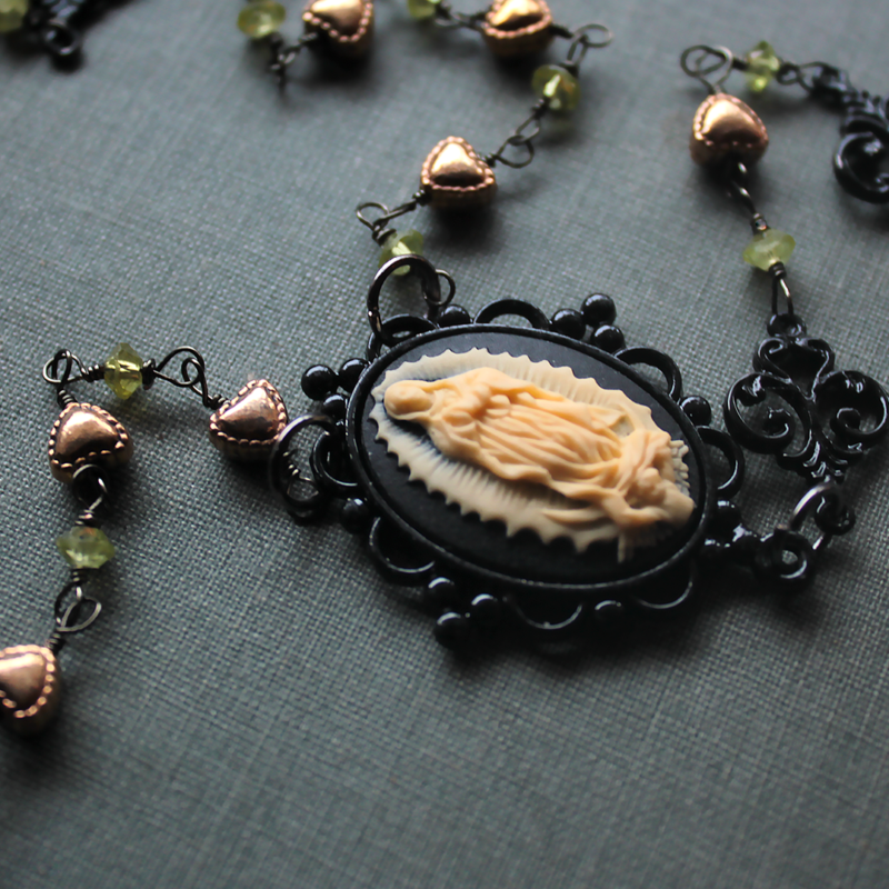 (SOLD) Black Rosary with Green Peridot and Heart Beads